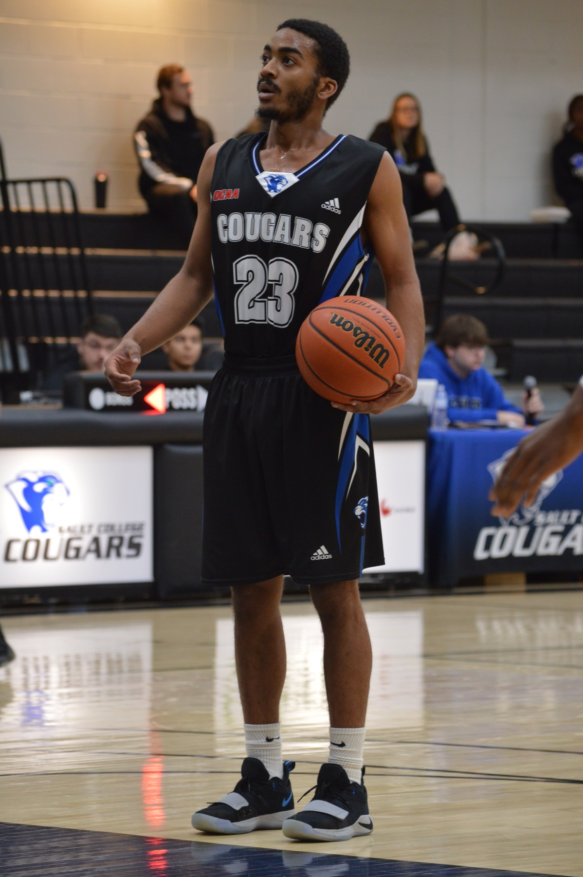 Cougar men survive in overtime; beat Canadore