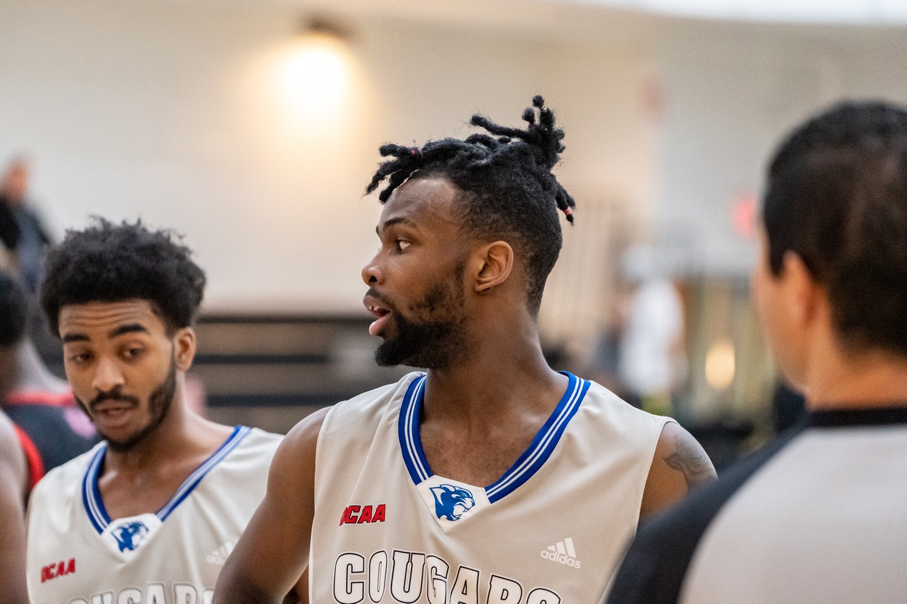 Cougars earn split against Knights